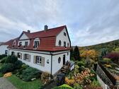 Foto - Doppelhaushälfte in Aue mit Garagen und Gartenhaus