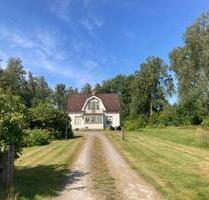 Ferienhaus in Schweden mit Seeblick - Rosengarten