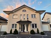 Foto - Exklusives Einfamilienhaus mit 2 Garagen