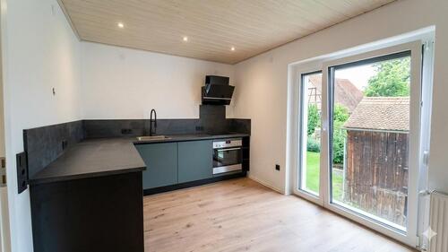 Foto - Modernes 90m²-Juwel: Design-Küche, Highspeed & Grüne Energie!