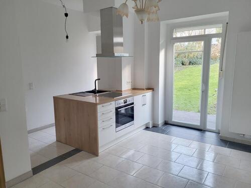 Foto - 1,5-Zimmer Wohnung im EG mit Kücheninsel, Terrasse und Garten