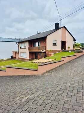 Foto - Einfamilienhaus mit Einliegerwohnung