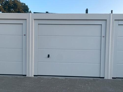 Foto - Neubaugarage mit Sektionaltor, Strom, Fernbedienung