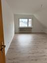 Foto - Helle 3-Zimmer-Dachgeschosswohnung in Flörsheim