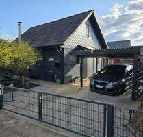 Holzhaus in Grußendorf mit großem Grundstück & Badesee - Sassenburg