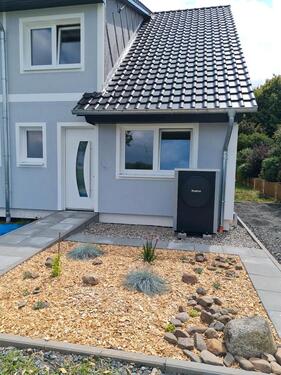 Foto - Neubau Doppelhaushälfte mit Carport