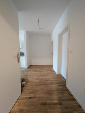 Foto - Neuwertige 3 ZKB mit Echtholzboden und Balkon