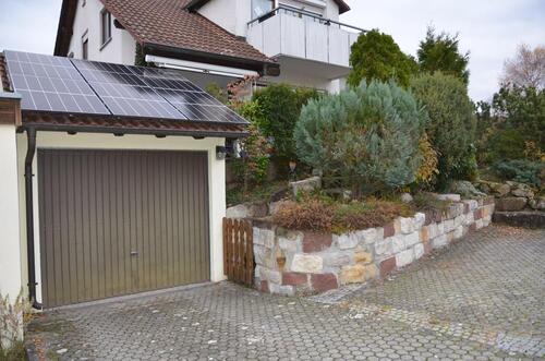 Foto - 3 - Zimmer Wohnung mit Gartenanteil, Terrasse und Garage