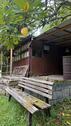 Foto - Garten Grundstück mit Zaun großer Hütte WC und Bach