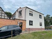 Foto - Einfamilienhaus mit Parkplatzgrundstück zu verkaufen
