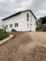 Foto - Modernes Einfamilienhaus mit Solar und Luftwärmepumpe