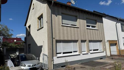 Foto - Mehrfamilienhaus im Zentrum von Bürstadt mit großem Garten