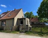 Foto - Siedlungshaus mit großem Grundstück & Baugenehmigung