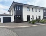 Foto - 147 m² DHH mit hohen Wohnkomfort, modernem Garten und Garage