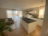 Foto - Moderne, teilmöblierte 2-Zimmer-Wohnung mit Einbauküche & Carport