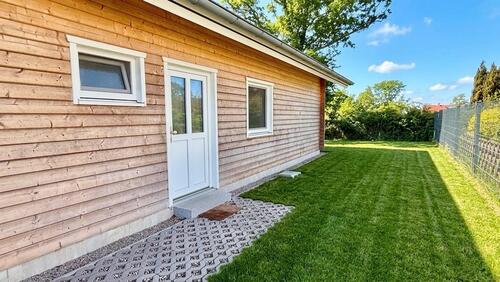 Foto - Neubau Einfamilienhaus Bungalow mit Garten