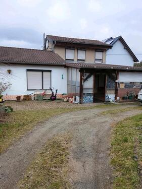 Foto - kleines Häuschen mit großem Grundstück