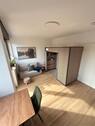 Foto - gehobenes 1-Zimmer-Apartment im Japandi-Style mit Balkon