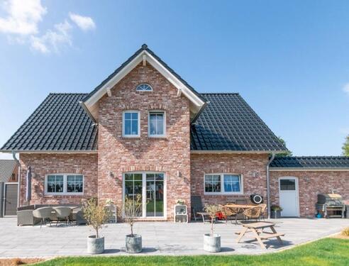 Foto - Modernes Einfamilienhaus mit Schlesswig Holsteiner Charme