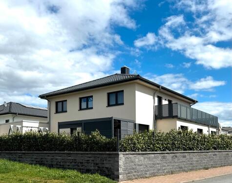 Foto - Modernes Einfamilienhaus mit Einliegerwohnung