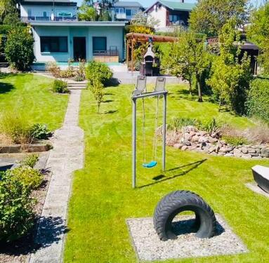 Foto - Mecklenburgische Seenplatte Ferienhaus Ferienwohnung inkl. Boot