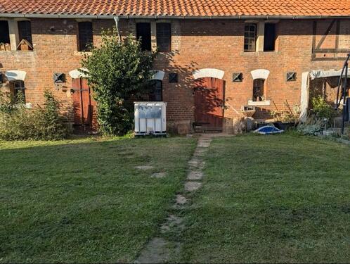 Foto - 2,5-Zimmer-Wohnung mit Küche, Holzofen und kleiner Grünfläche