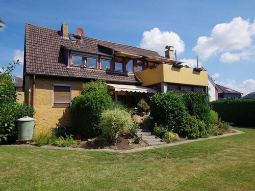 Foto - Zwei Familien. Ein Zuhause. Viele Möglichkeiten.