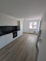 Foto - Frisch renovierte 2.5 Zimmer Wohnung mit moderner Einbauküche