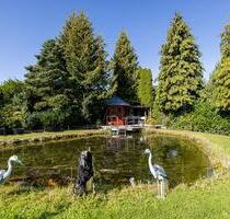 3 Zimmer Wohnung mit großen Garten und Badeteich in Scharbeutz - Stockelsdorf