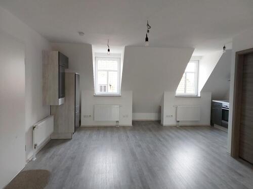 Foto - Große Dachgeschosswohnung mit Balkon und offener Raumaufteilung