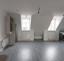 Große Dachgeschosswohnung mit Balkon und offener Raumaufteilung - Rendsburg