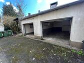 Foto - 2 Garagen + Carport + Außenstellfläche zu vermieten