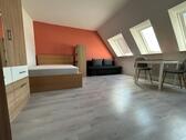 Foto - Gemütliche 1-Zimmer-Dachgeschosswohnung – Voll möbliert