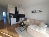 Foto - 2-Zimmer Neubau mit Einbauküche, Balkon, Möblierung & Tiefgarage