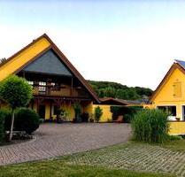 Einfamilienhaus mit großem Grundstück, Badeteich & Baureserve - Melle
