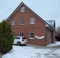 Zentral gelegene Wohnung mit Südbalkon und Carport im ersten OG - Heide