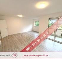 Trier-Heiligkreuz: Stadtnahe 3 ZKB- Wohnung mit Balkon, Einbauküche & Tiefgaragenplatz – wird umfassend renoviert!