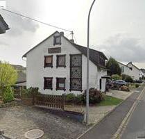 Einfamilienhaus mit WerkstattLagerhallen - Büchel