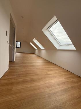 Foto - Hochwertige Dachgeschosswohnung in kernsanierter Scheune