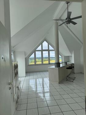 Foto - Lichtdurchflutete Wohnung mit Balkon, Kachelofen & Traum-Ausblick