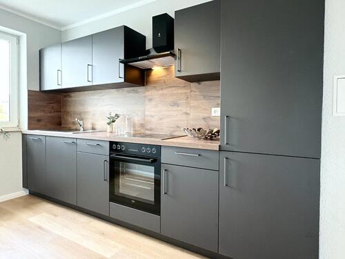 Foto - Erstbezug nach Sanierung! Moderne 3-Zi.-Wohnung mit Einbauküche, Balkon & PKW-Stellplatz