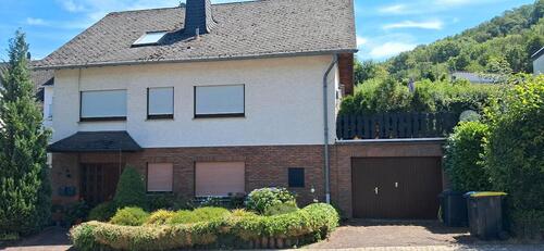 Foto - Einfamilienhaus mit Einliegerwohnung