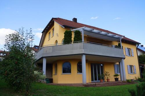 Foto - Einfamilienhaus mit Einliegerwohnung am Südhang mit Erdwärmepumpe
