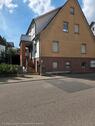 Foto - Einfamilienhaus mit Garage und Garten