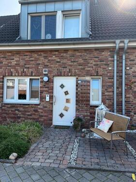 Foto - Modernes Reihenhaus mit Terrasse und Garten
