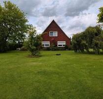 Großes Familienhaus (ca.1970) mit 1.526 m² Grundstück in Moordorf - Südbrookmerland