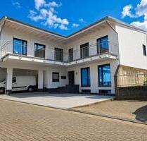 Modernes Mehrfamilienhaus mit 3 Wohneinheiten - Solms