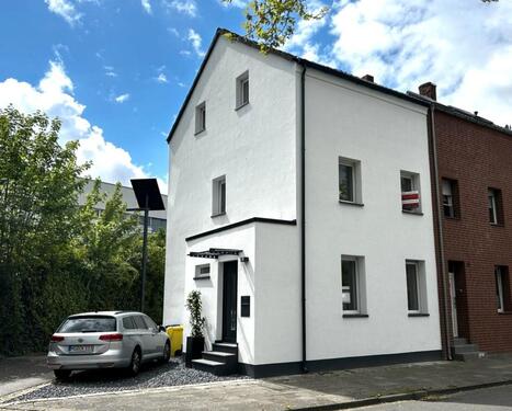 Foto - Stilvoll kernsaniertes Reihenendhaus mit Süd-Garten – bezugsferti