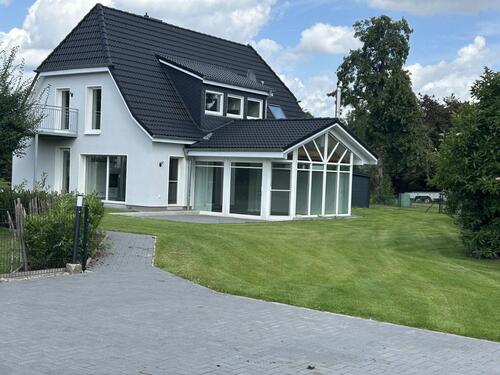 Foto - Erdgeschosswohnung mit Wintergarten, Terrasse und Garten