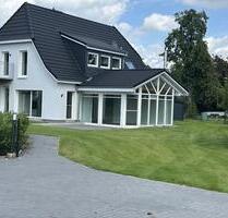 Erdgeschosswohnung mit Wintergarten, Terrasse und Garten - Tarmstedt